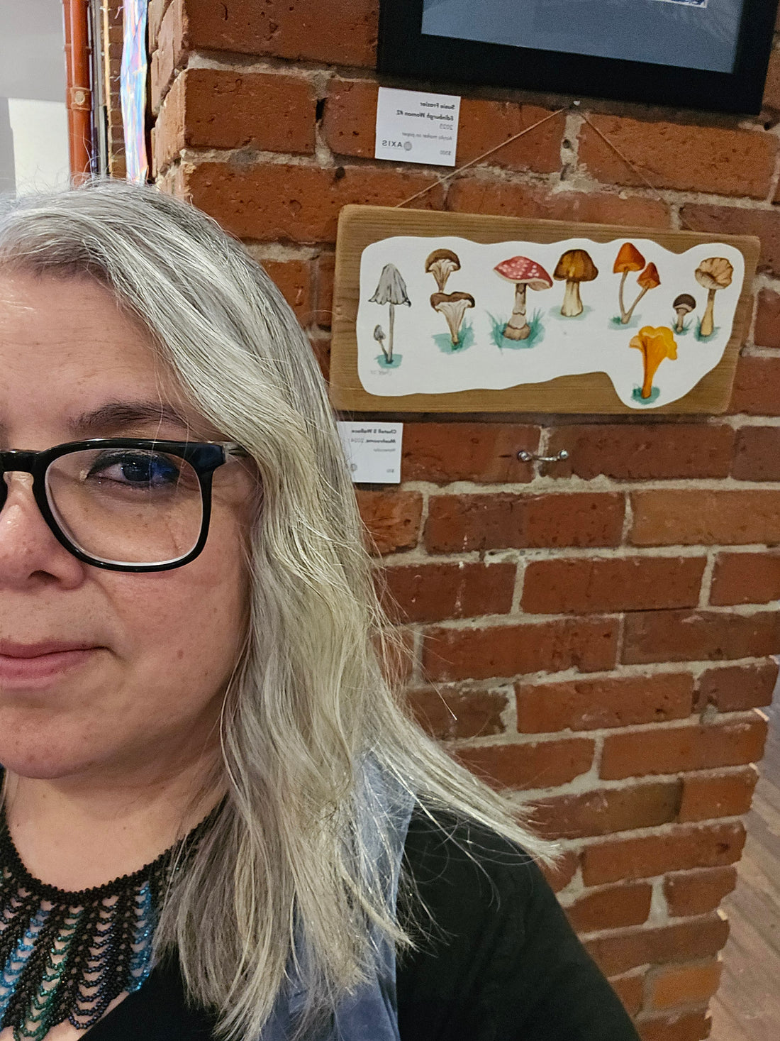 Mushroom watercolor painting and the artist. 